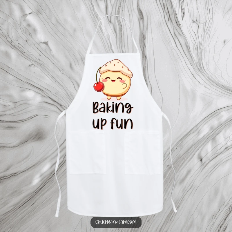 Funny apron illustrating a giggling, plump muffin with rosy cheeks bouncing a cherry, ready for delicious baking adventures.