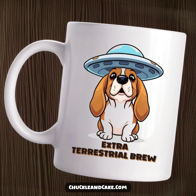 Funny Basset Hound mug with a curious expression looking up at a flying saucer, depicting an alien encounter.
