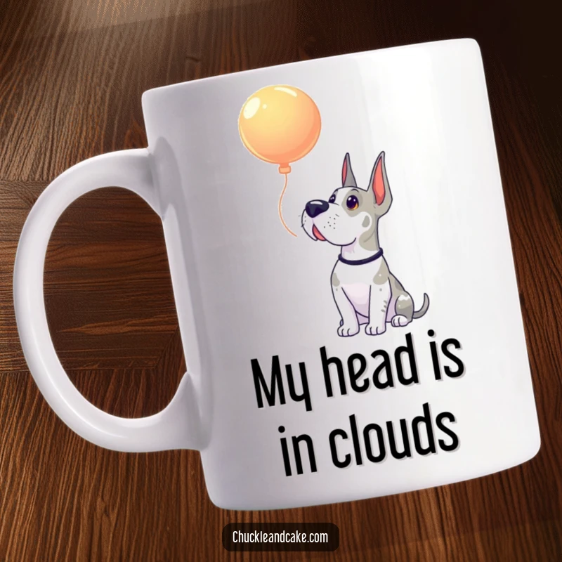 Funny Grand Dane mug showing a majestic dog gazing upwards with wide-eyed amazement at a floating colorful balloon.