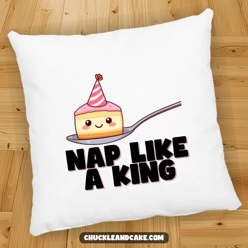 Funny pillow featuring a smiling, party hat-wearing cake slice balancing on a spoon, offering comfort and a side of sweet humor.