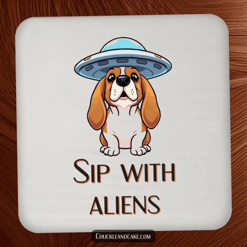 Funny Basset Hound coaster with a curious dog looking up at a flying saucer, perfect for protecting tables.