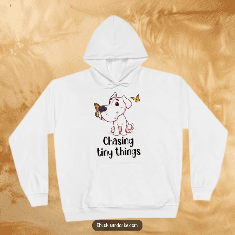 Funny Grand Dane hoodie showing a dog with a gentle, curious gaze focused on a delicate butterfly in flight.