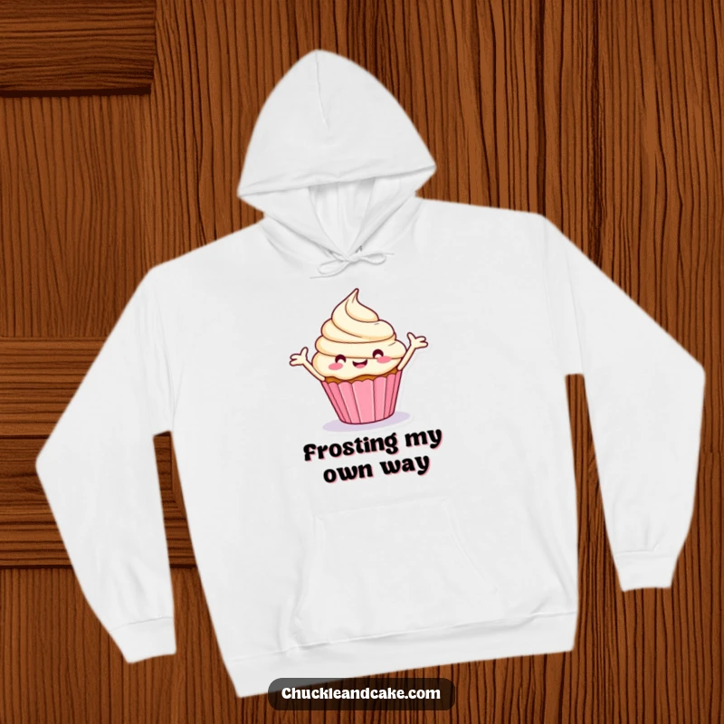 Funny hoodie showcasing a stylized, happy cupcake spinning merrily with its frosting arms outstretched.