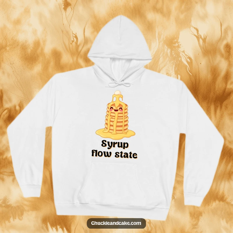 Funny pancake hoodie depicting a happy pancake stack embarking on a syrup waterfall adventure, offering warmth and humor.