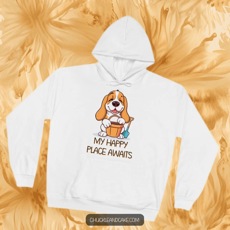 Funny Basset Hound winking with bucket and spade, ready for beach fun, featured on a warm hoodie.