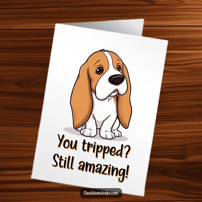 Funny Free Printable Congratulations Card: A Basset Hound with long droopy ears hilariously trips over its own ears, a clumsy celebration.