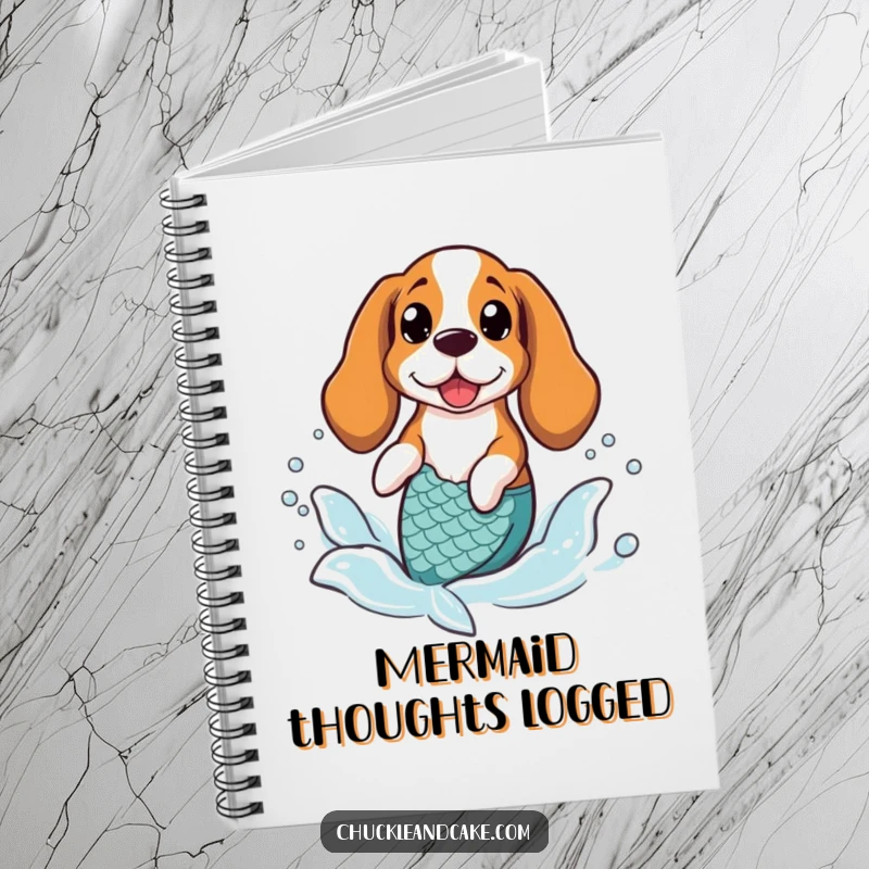 Funny Basset Hound wearing a mermaid tail, splashing in gentle waves, featured on a notebook cover.
