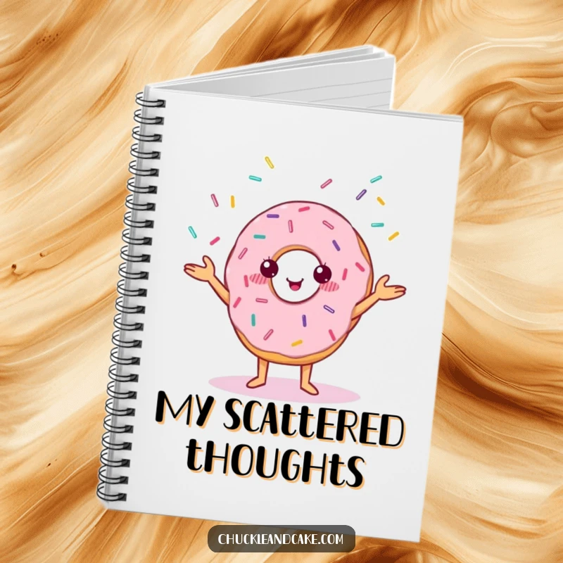 Funny notebook cover with a cheerful donut with small eyes juggling colorful sprinkles.