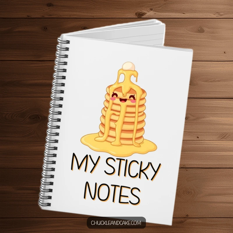 Funny pancake notebook cover depicting a joyous pancake stack descending a syrup waterfall, inspiring creativity and sweet thoughts.