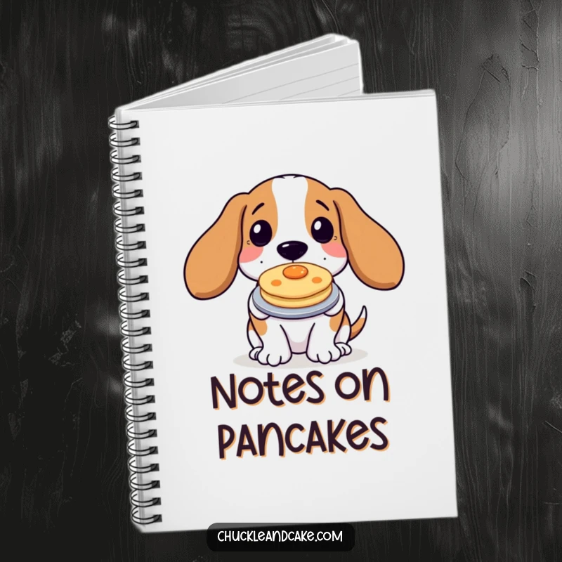 Funny Basset Hound Pancake Notebook featuring a proud dog with a small pancake, perfect for jotting down notes joyfully.