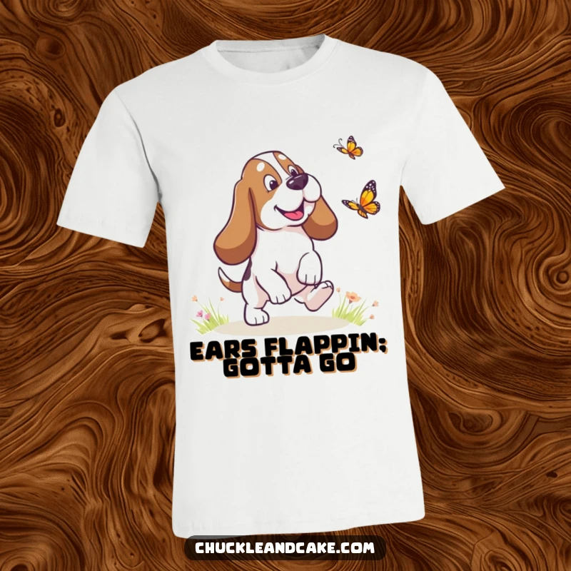 Funny Basset Hound with droopy ears chasing a butterfly, humorous dog t-shirt, playful pet design, great funny gift for dog lovers.