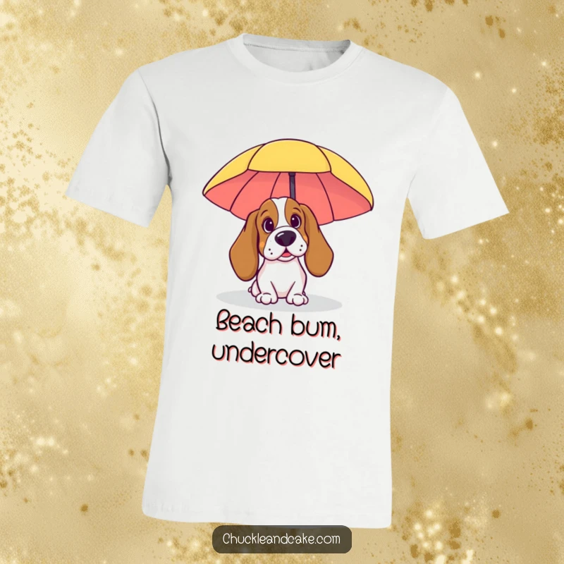 Funny Beach Basset Hound T-Shirt: A Basset Hound peeking from behind a beach umbrella, showcasing a playful, vacation mood.