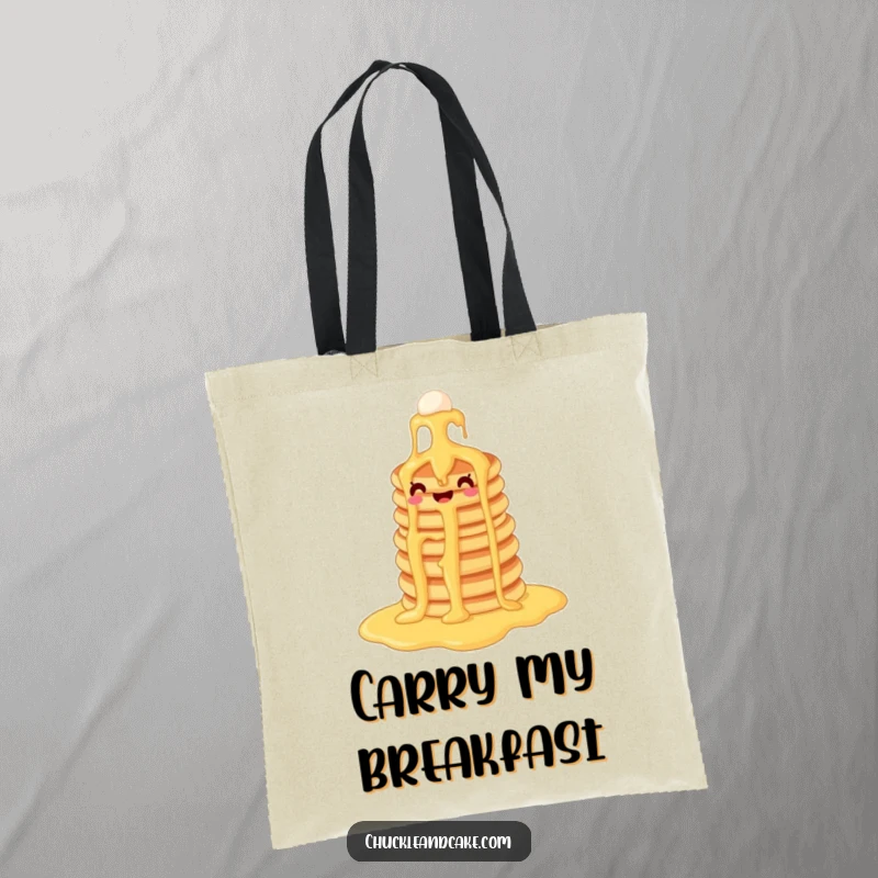 Funny pancake tote bag illustrated with pancakes flowing down a syrup waterfall, perfect for grocery runs and carrying smiles.